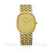 A GENTLEMAN`S LARGE SIZE 18K SOLID GOLD PATEK PHILIPPE ELLIPSE AUTOMATIC BRACELET WATCH DATED