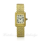 A LADIES 18K SOLID GOLD CARTIER PARIS TANK BRACELET WATCH CIRCA 1980s D: Silver dial with applied