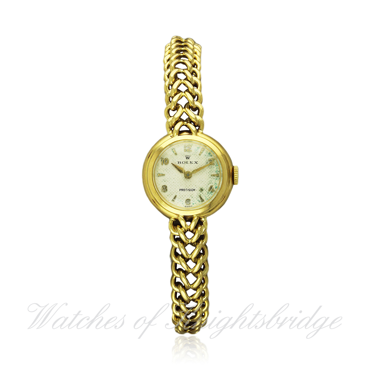 A LADIES 18K SOLID GOLD ROLEX PRECISION BRACELET WATCH CIRCA 1950s D: Silver "honeycomb" dial with