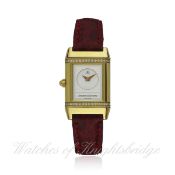 A FINE LADIES 18K SOLID GOLD & DIAMOND JAEGER LECOULTRE REVERSO DUETTO WRIST WATCH CIRCA 2001,