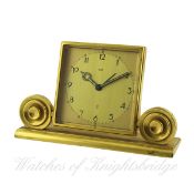 A JAEGER 2 DAY ALARM DESK CLOCK CIRCA 1950s D: Champagne colour dial with applied Arabic numerals,