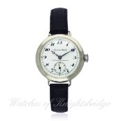 A GENTLEMAN`S SOLID SILVER INTERNATIONAL WATCH CO. WRIST WATCH CIRCA 1920s D: White enamel dial with