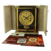 A RARE JAEGER LECOULTRE ELYSEE ATMOS CLOCK DATED 1976, REF. 941 WITH ORIGINAL BOX, PAPERS & BOOKLETS