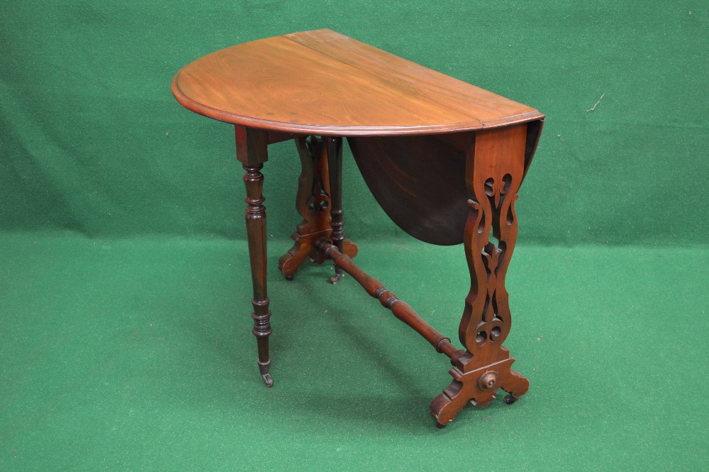 A Victorian mahogany Sutherland table the top having moulded edge with bow ends, supported by shaped