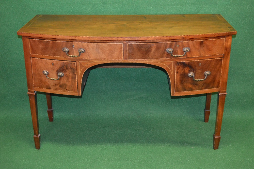 A mahogany bow front sideboard with cross banded inlay, two long drawers over one short drawer to