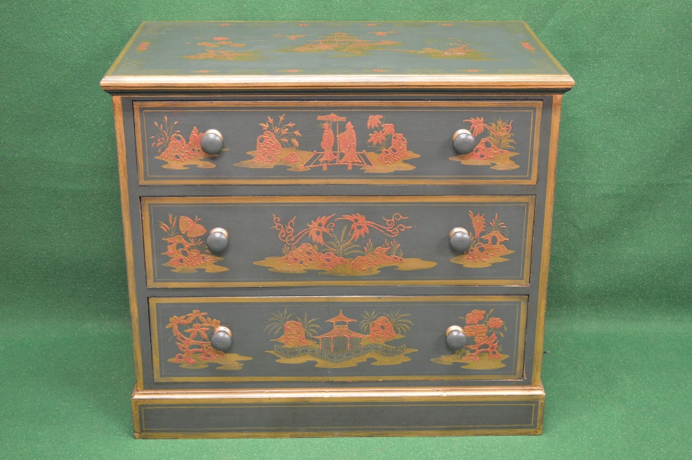 A green painted chest of drawers decorated with scenes of figures, flowers and Oriental buildings