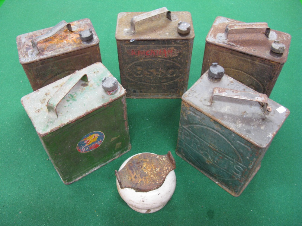 A group of five two gallon petrol cans from Esso and Pratts etc together with a Southern Railway