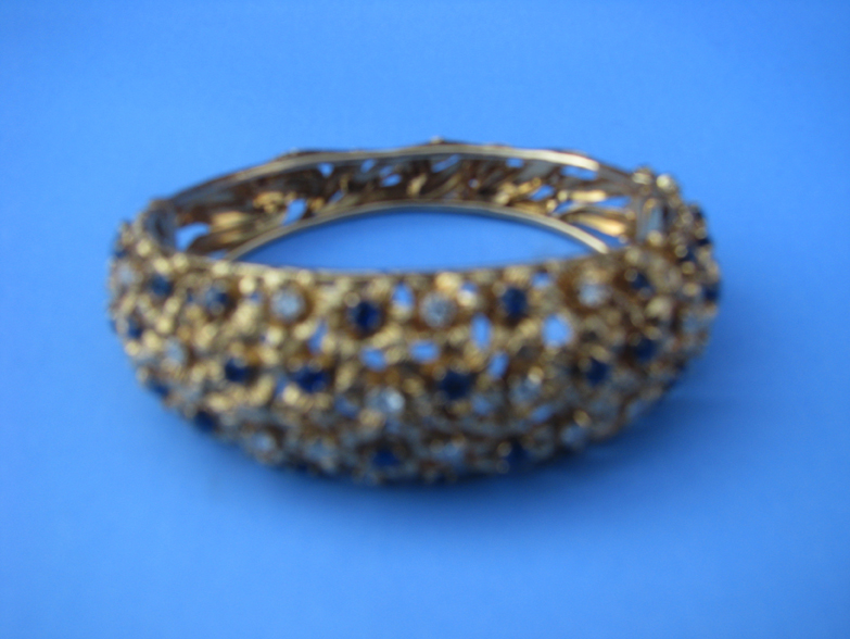 A 21ct Indian Gold Bracelet set with Pearls and Cabuchons.