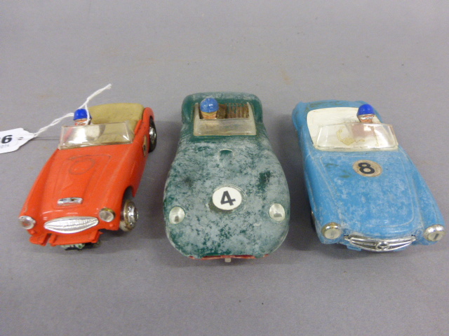 Three Triang Scalextric cars in average/poor condition including Lister Jaguar