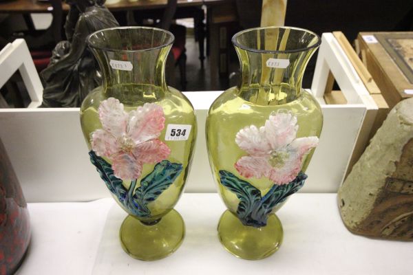 A Pair of Victorian Green Glass Vases with applied glass flower designs