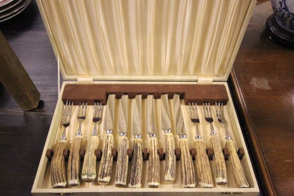 A Cased Set of Antler Handled Redge Knife and Fork Set