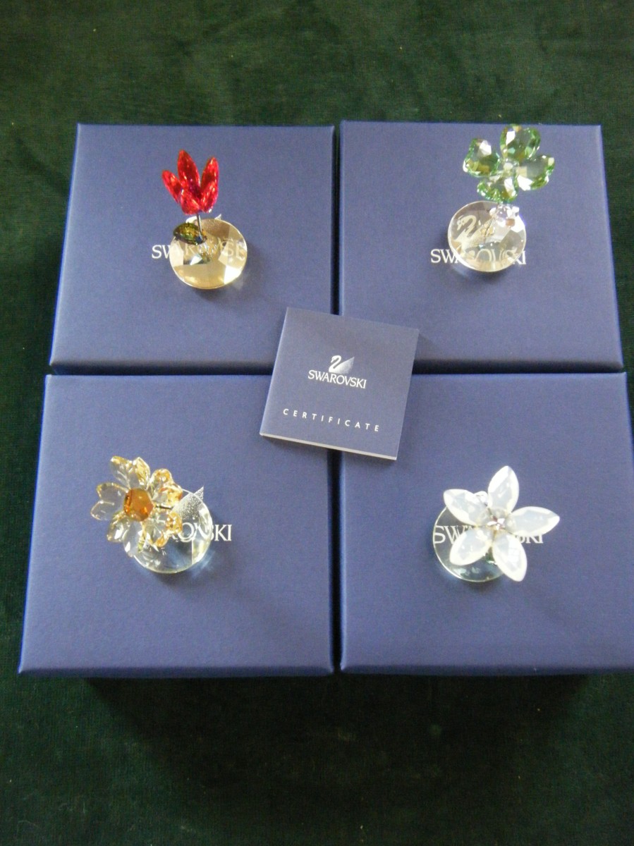 Swarovski crystal 2 x boxed items, Flowers on stem, No: NROOO249 Lou, and Joy, No: NROOO248