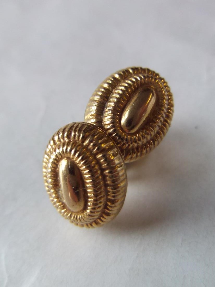 Pair of embossed gold oval earrings
