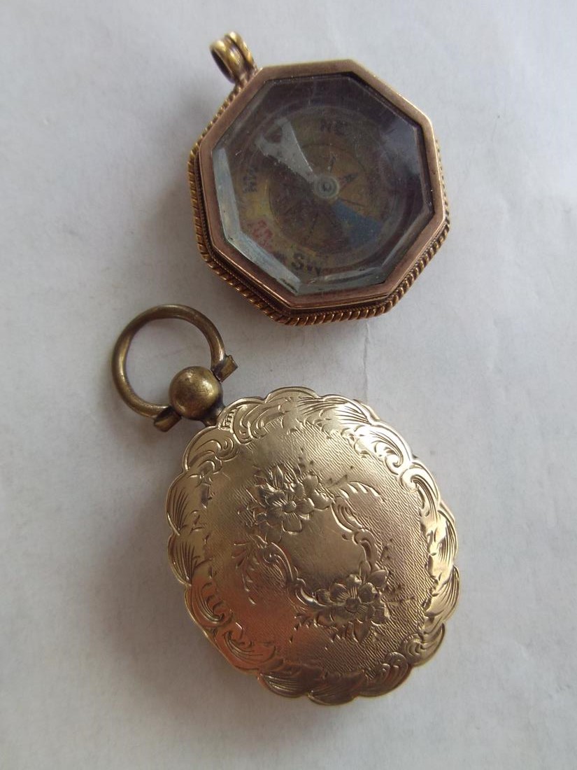 Gold mounted compass fob in octagonal frame and a  gold back and front locket