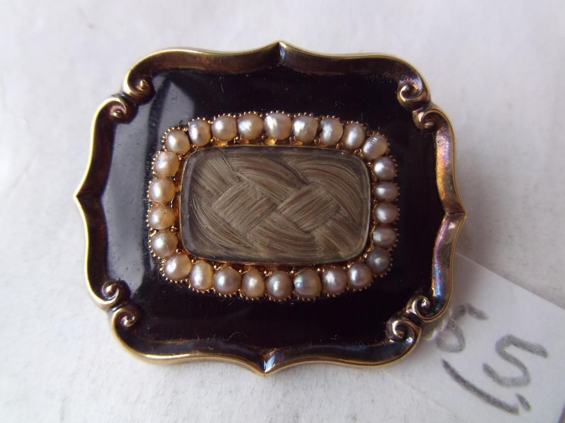 Early Victorian pearl and enamel brooch with plaited  hair centre