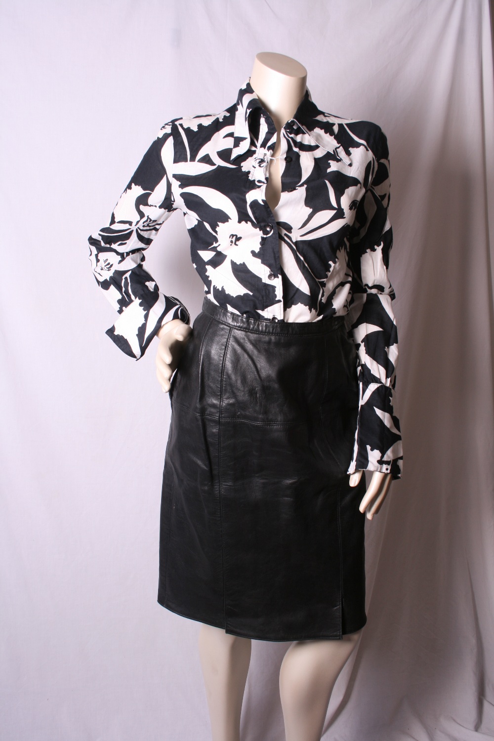 Quantity of black leather skirts, mainly 1980s, in various styles and sizes (mainly 10-12), (12)