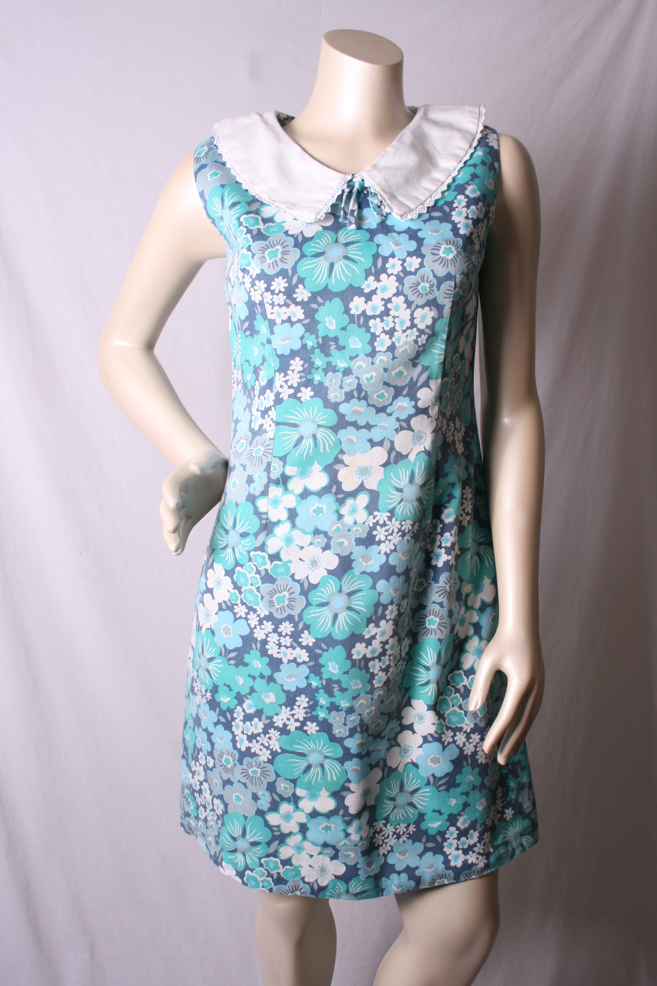 Group of five 1960s-70s summer dresses: one white cotton sundress with flower print; one blue cotton