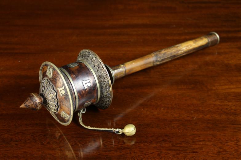 A Chinese/Tibetan Prayer Wheel with paper prayers.