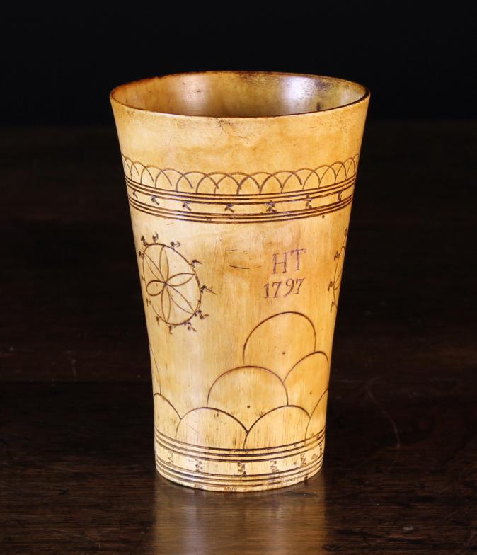 An 18th Century Horn Beaker engraved with geometric decoration, initials HT and date 1797, 6 ins (15