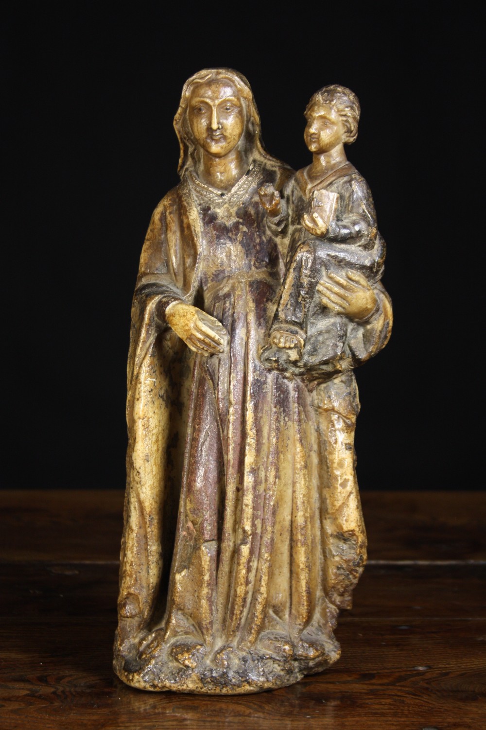 A Fine 16th Century Polychromed Alabaster Figure Carving of Virgin & Child, 15¾ ins (40 cms) high.