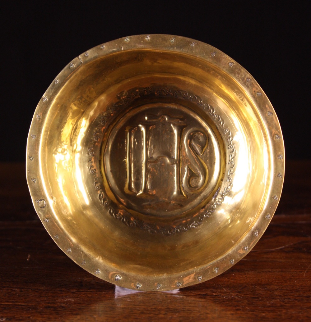 A Small & Rare 16th Century Nuremberg Brass Alms Bowl.  The centre panel with holy initials IHS