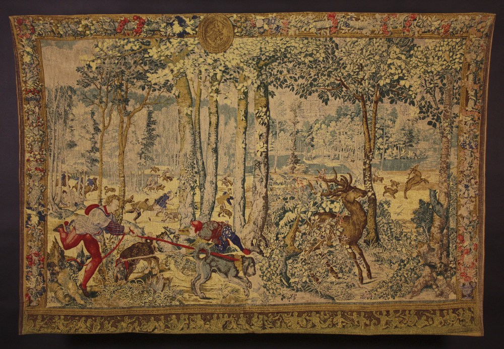 A 'Tapestry' Wall Hanging: A printed reproduction of an early 16th century hunting scene: 'Chasse de