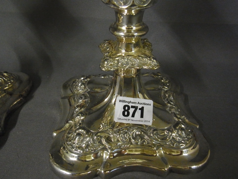 A pair of large Sheffield plate candlesticks in the Georgian style 
Condition report: One requires - Image 2 of 5