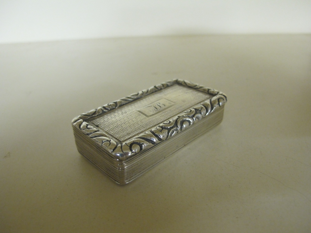 A William IV silver engine turned rectangular snuff box with foliate border - initialled by C & S