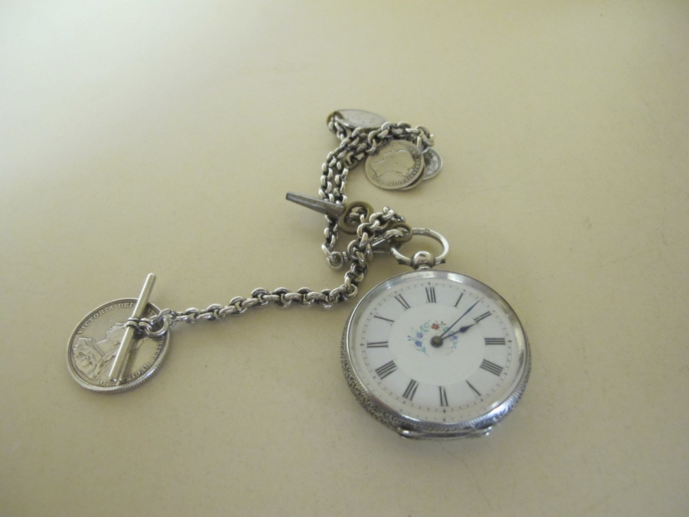A French silver key wind pocket watch with painted enamel dial and Swiss bar movement with chain fob