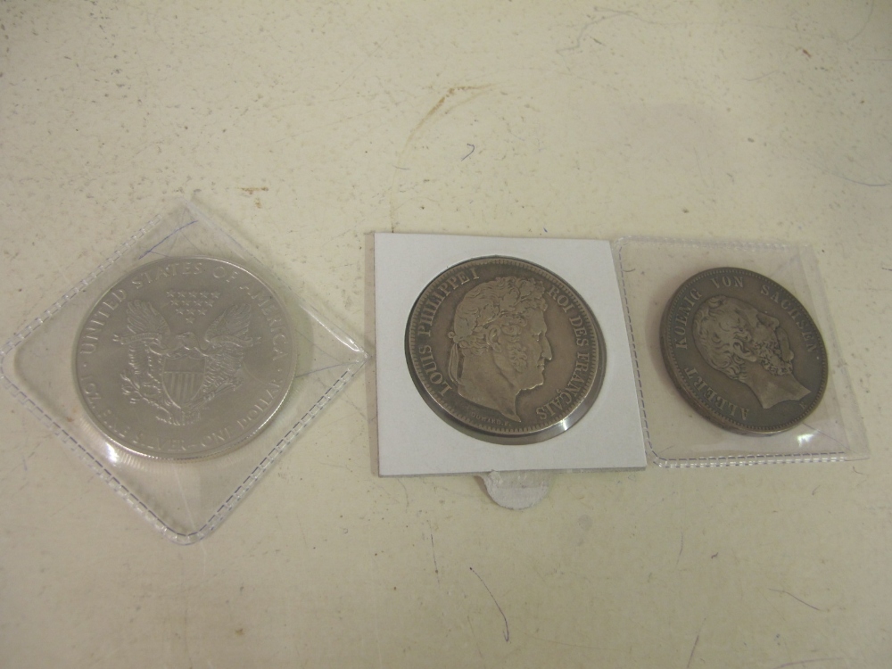 An uncirculated 2010 American silver Eagle dollar and an 1839 silver five Franc coin - rare nice