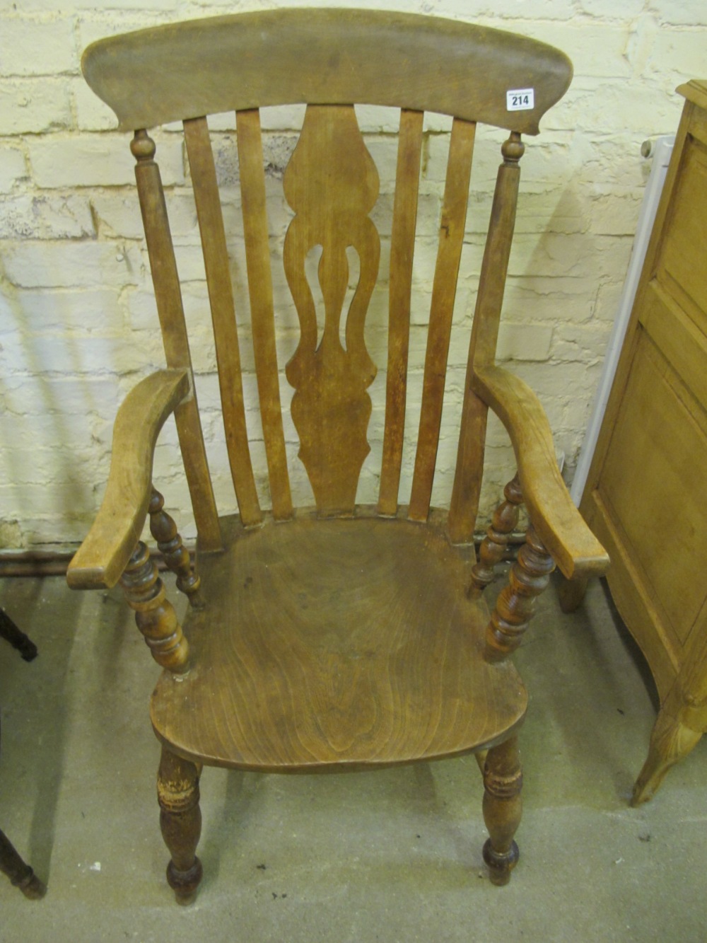 A 19th century ash and elm grandfather chair