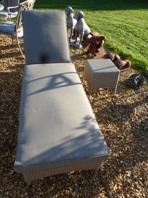 A Bramblecrest Pimlico sun lounger and coffee table - with cushions