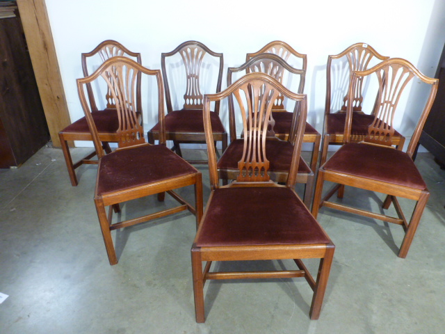 A set of eight modern mahogany dining chairs
