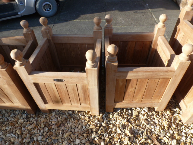 A pair of Bramblecrest medium teak planters