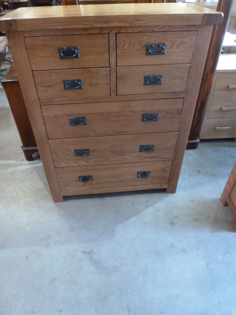 An oak ex display 4 + 3 chest of drawers - Height 119 cm x Width 98 cm x Depth 44 cm