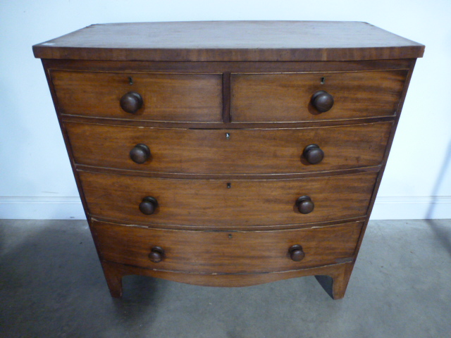 A 19th century mahogany bowfront chest with two short over three long drawers