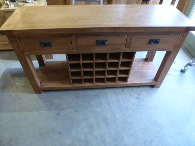 An oak ex display sideboard with wine rack - Height 81 cm x Width 150 cm x Depth 45 cm