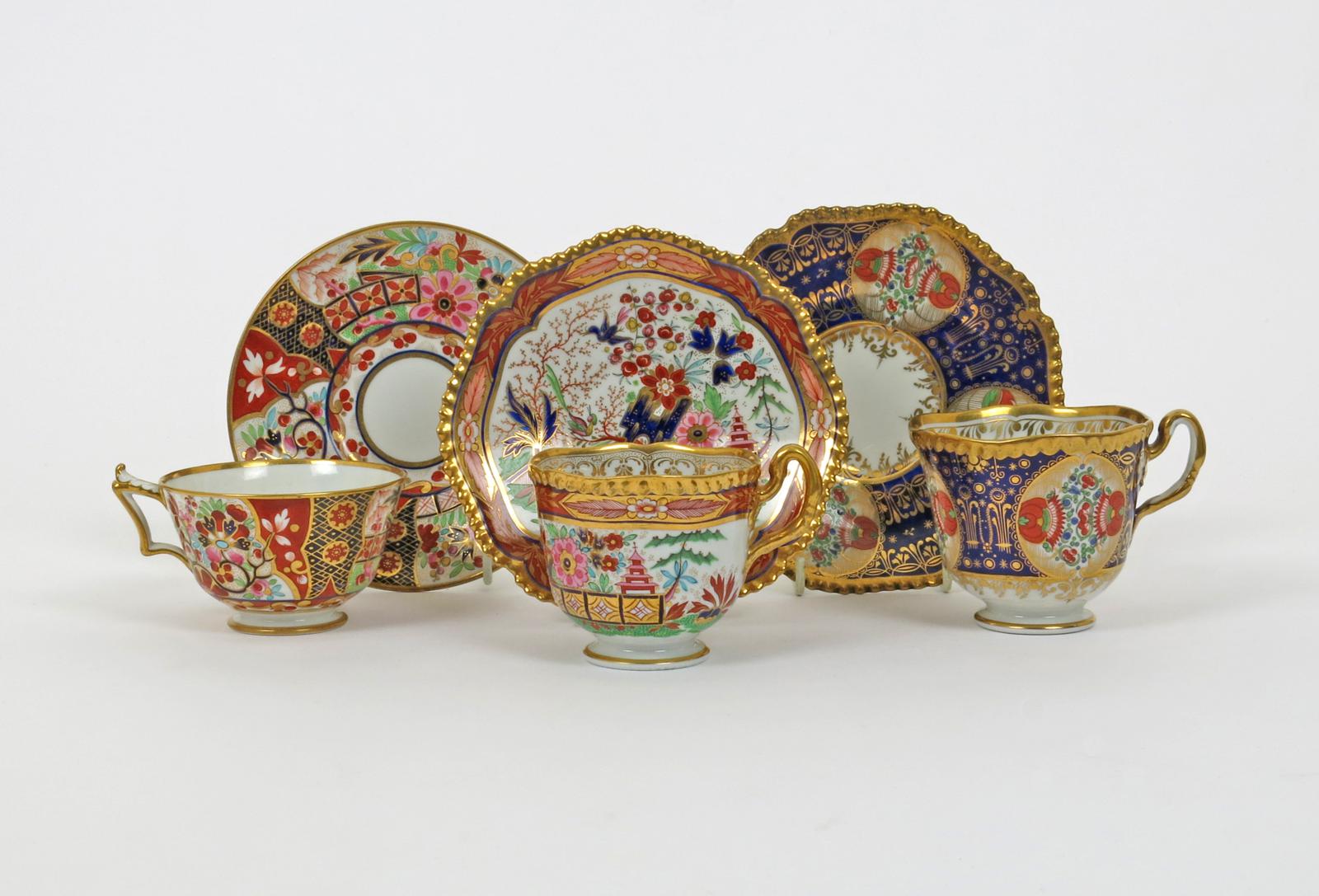 Three Flight Barr and Barr cups and saucers  c.1820-30, variously decorated in the Oriental manner