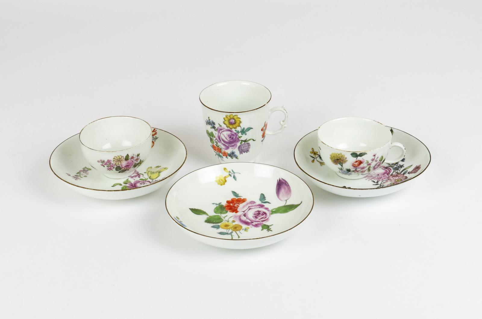 Three Meissen cups and three saucers  mid 18th century and later, variously painted with sprays and