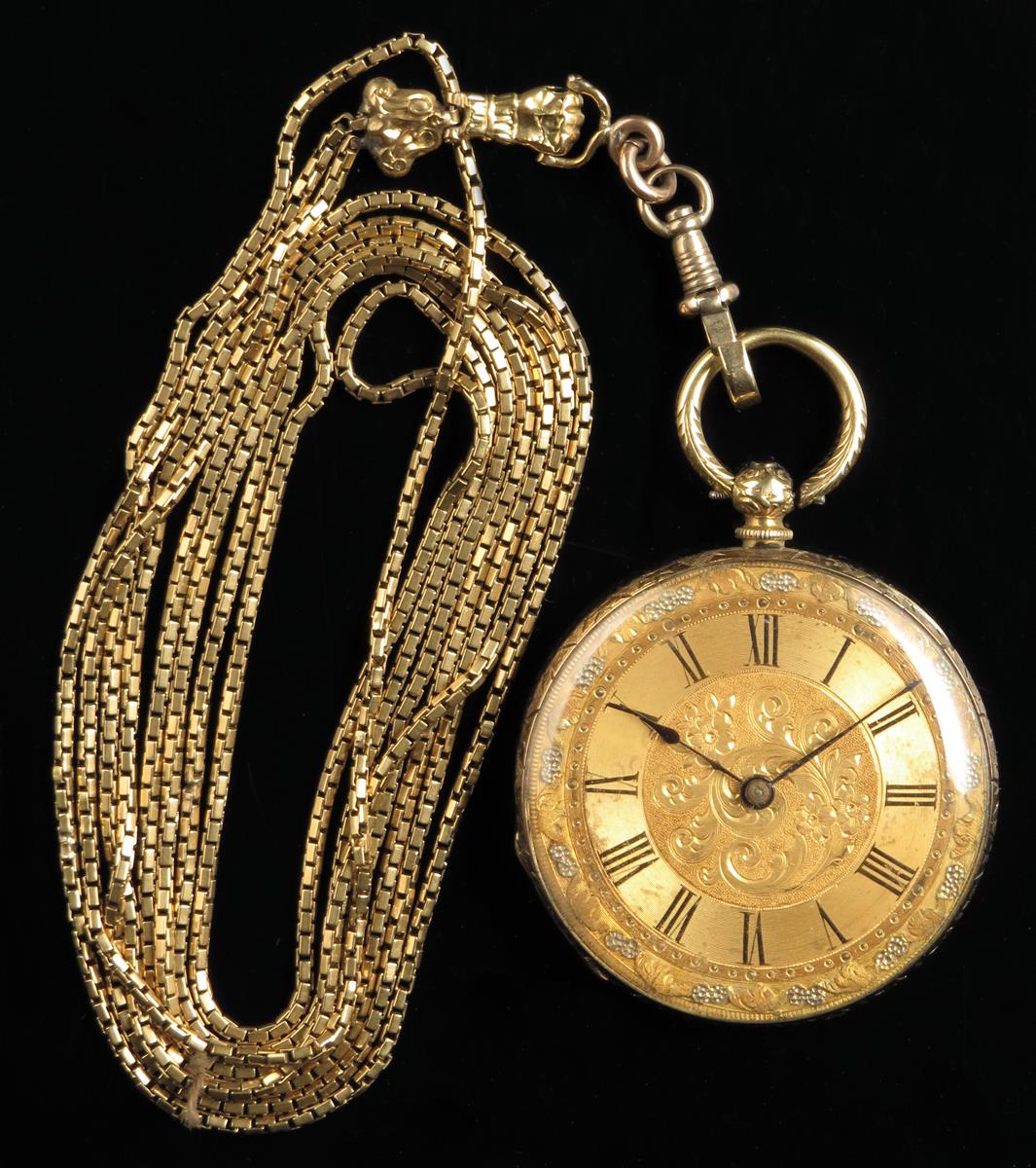 A Swiss 18k lady`s cylinder watch, florally engraved dial with raised border, in an engraved case,