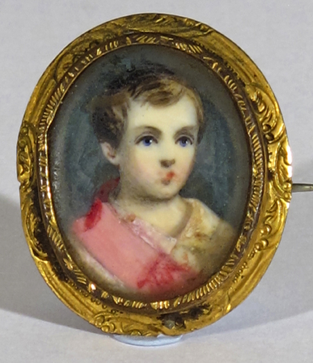 ? English School early 19th Century A young boy head and shoulders wearing pink Oval in a brooch