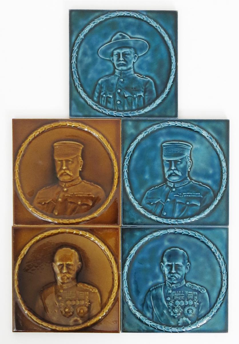 A Pilkington`s tile cast in low relief with a portrait of a Robert Baden Powell, in military