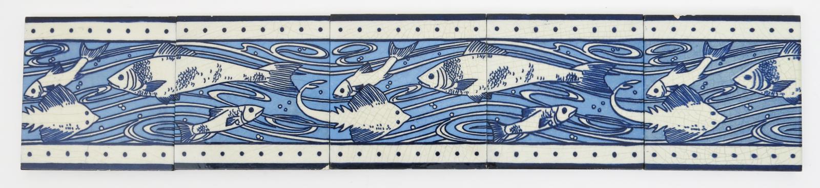 A Frieze of five Minton`s Aesthetic Movement tiles, printed with scaly fish swimming in turbulent