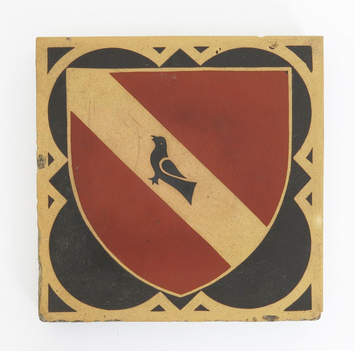 A Minton`s encaustic tile designed by A.W.N Pugin for St Augustine`s Ramsgate, decorated with a