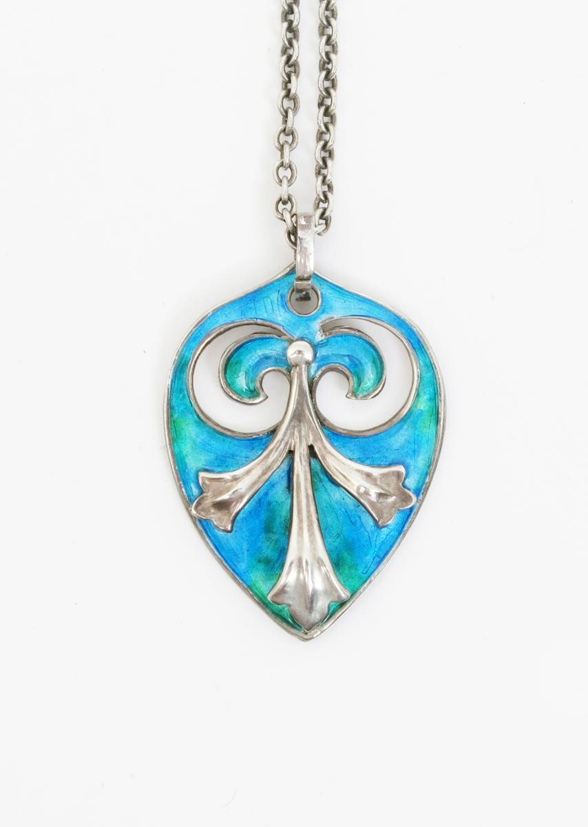 A William Hair Haseler silver and enamel pendant necklace, retailed by Liberty & Co, cast in low