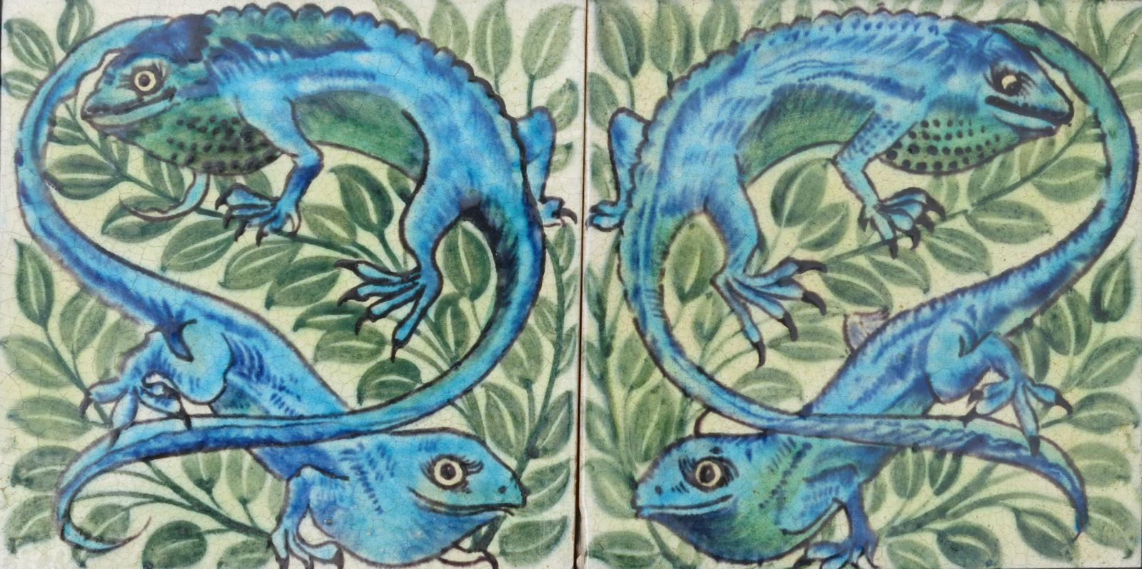 A fine pair of William De Morgan Sand`s End Pottery Chameleon tiles, painted in shades of green