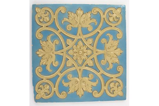 A large architectural tile, attributed to the Leeds Fireclay Company, cast in low relief with