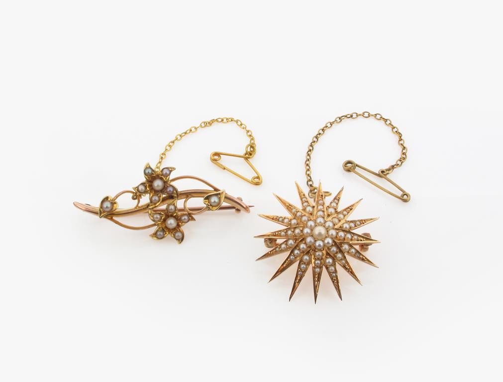 An Edwardian seed pearl set gold sunburst brooch, 2.6cm wide. And another seed pearl set gold