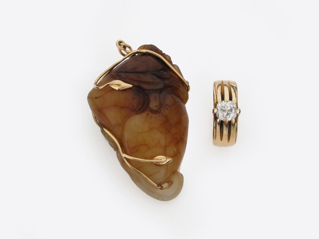 A cushion shaped diamond set gold ring, size S. And a gold mounted brown and white mottled hardstone