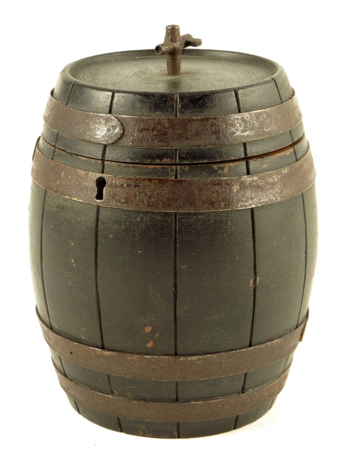 A rare late 19th century French ebonised fruitwood wine barrel tea caddy, with an iron tap and